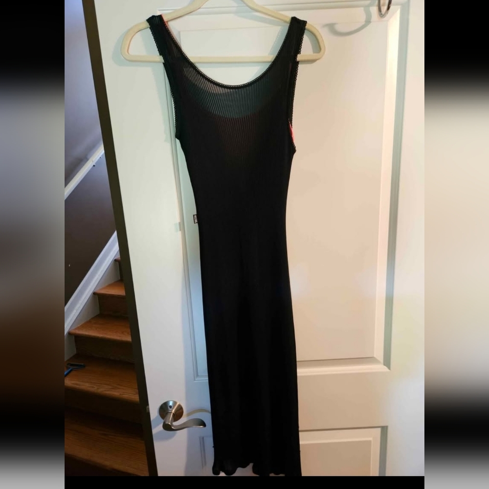 Moschino Brand.   Elegant Black Sleeveless Dress. Hot Pink Slip Underneath.